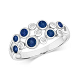 9ct White Gold 0.06ct Diamond & 0.61ct Sapphire Rubover Ring